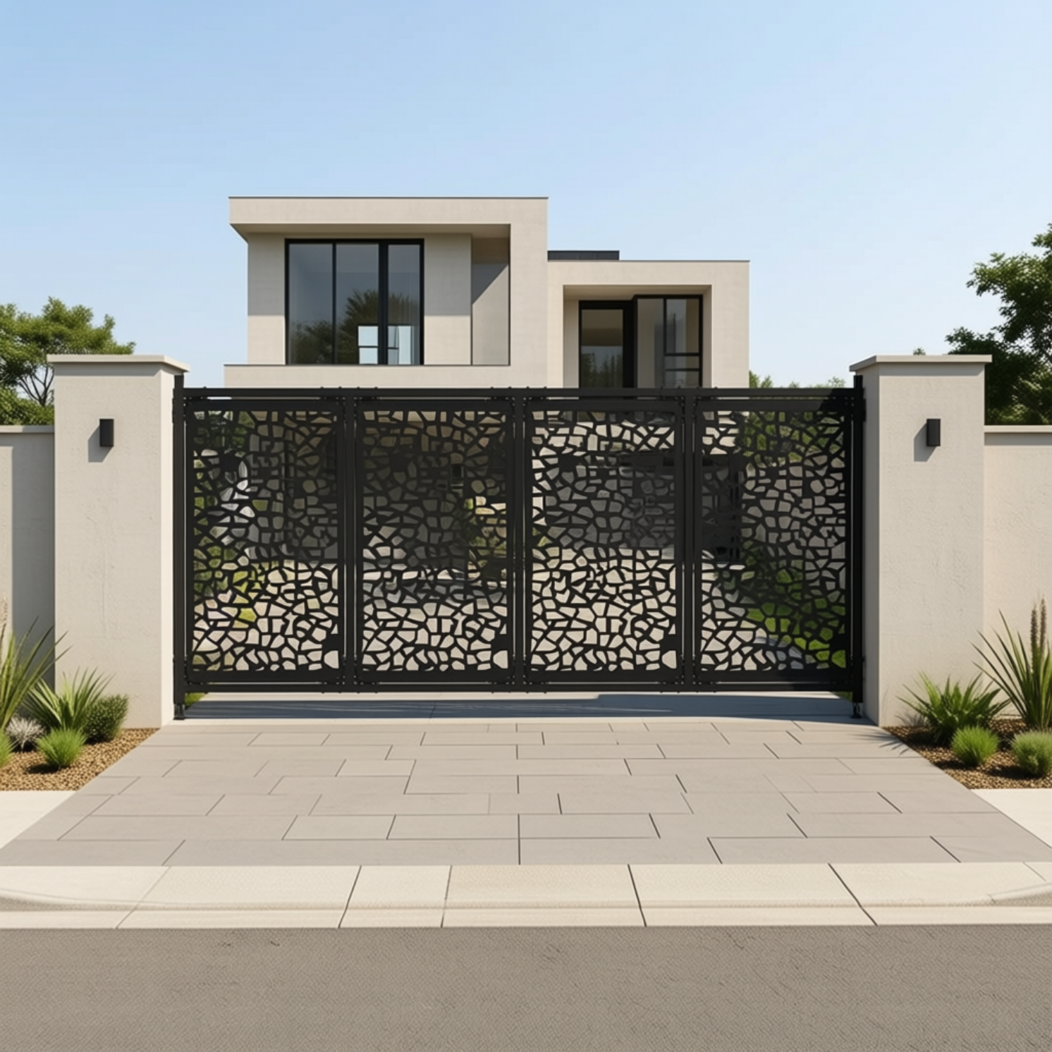 Modern laser-cut sliding driveway gate with decorative metal panels and powder-coated finish